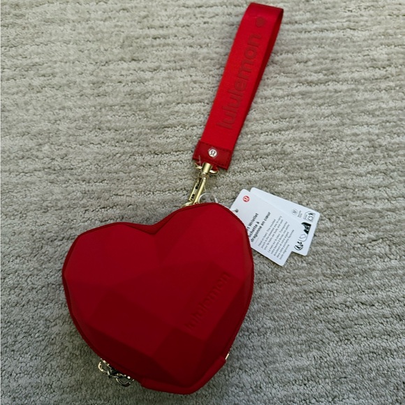 lululemon athletica Handbags - lululemon athletica Red Heart Wristlet 3d geometric